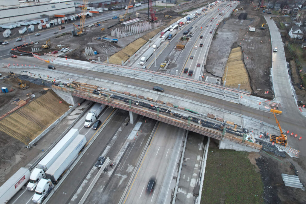 over bridge construction progress with traffic