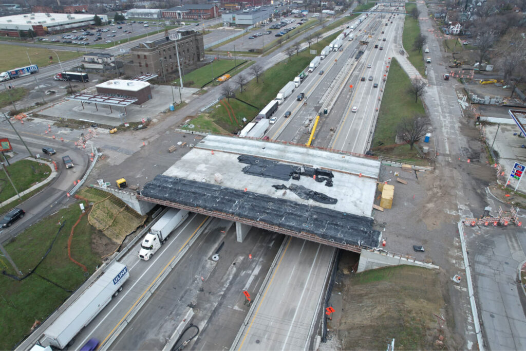 over bridge construction progress with traffic
