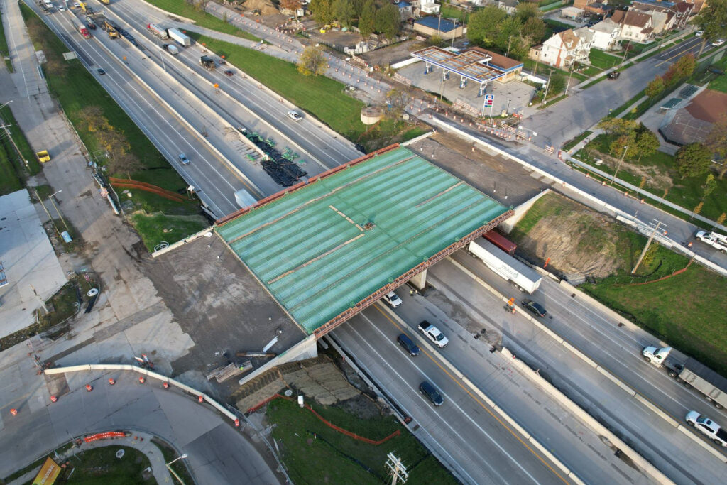 over bridge construction progress with traffic