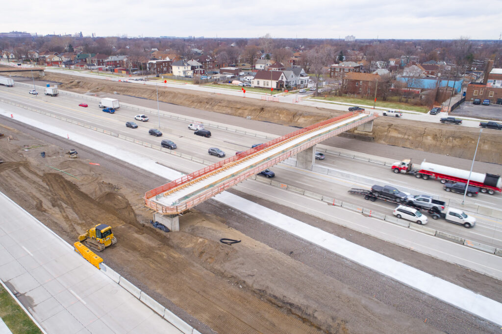 over bridge construction progress with traffic