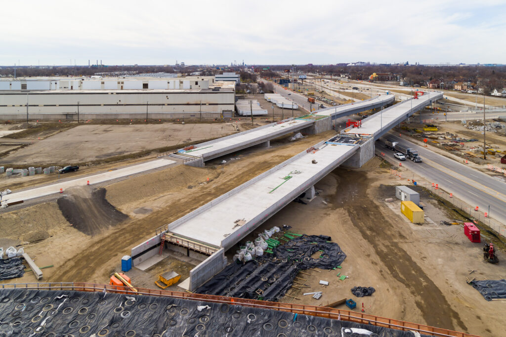 over bridge construction progress with traffic