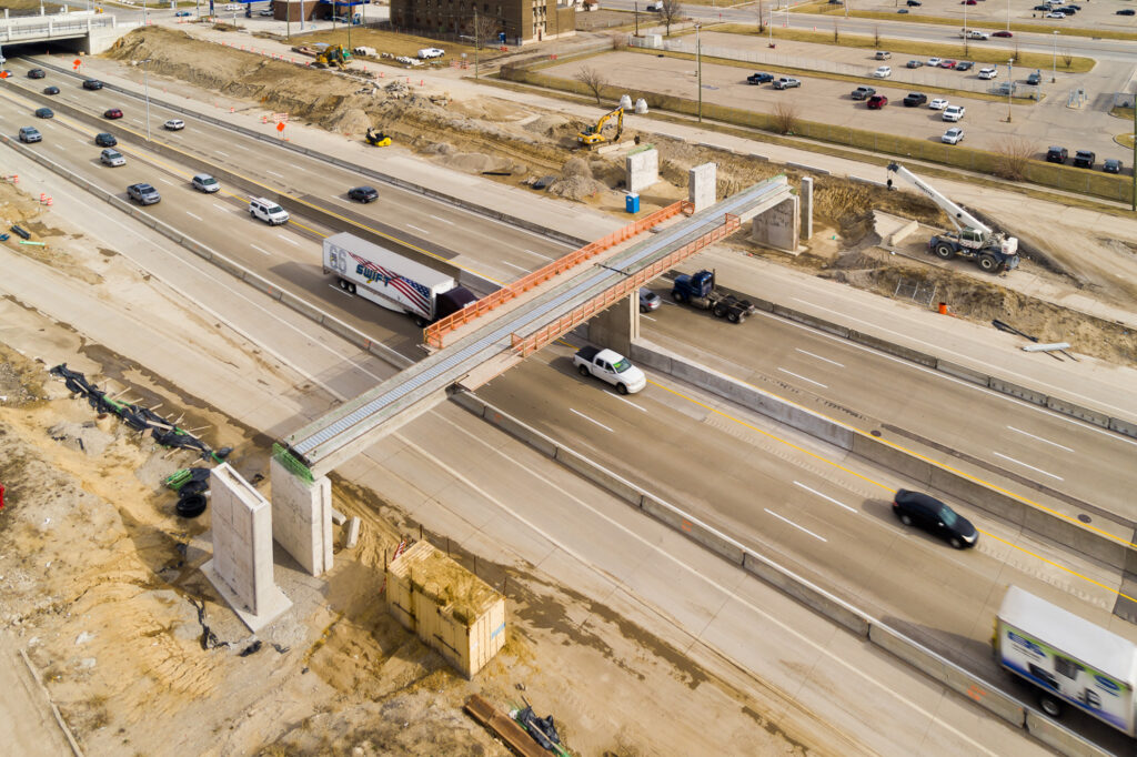 over bridge construction progress with traffic