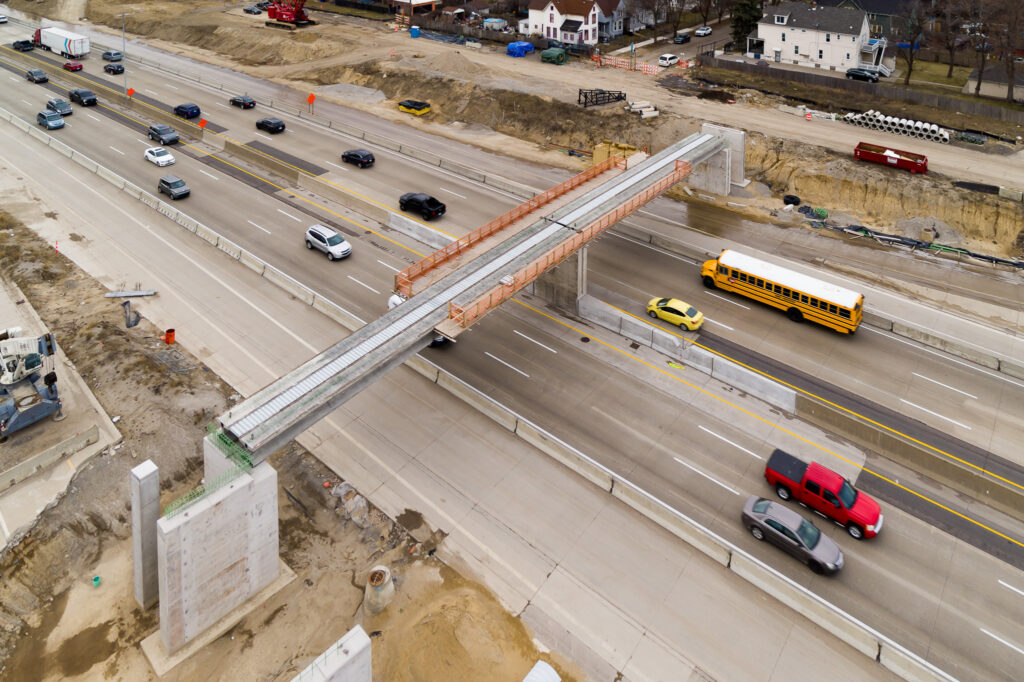 over bridge construction progress with traffic