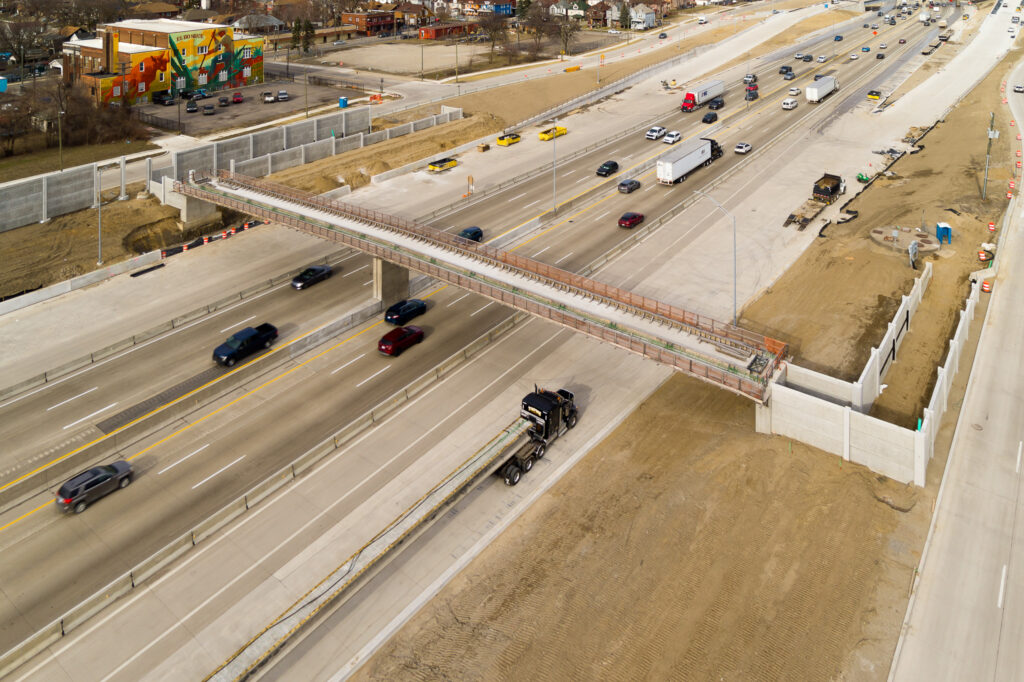 over bridge construction progress with traffic