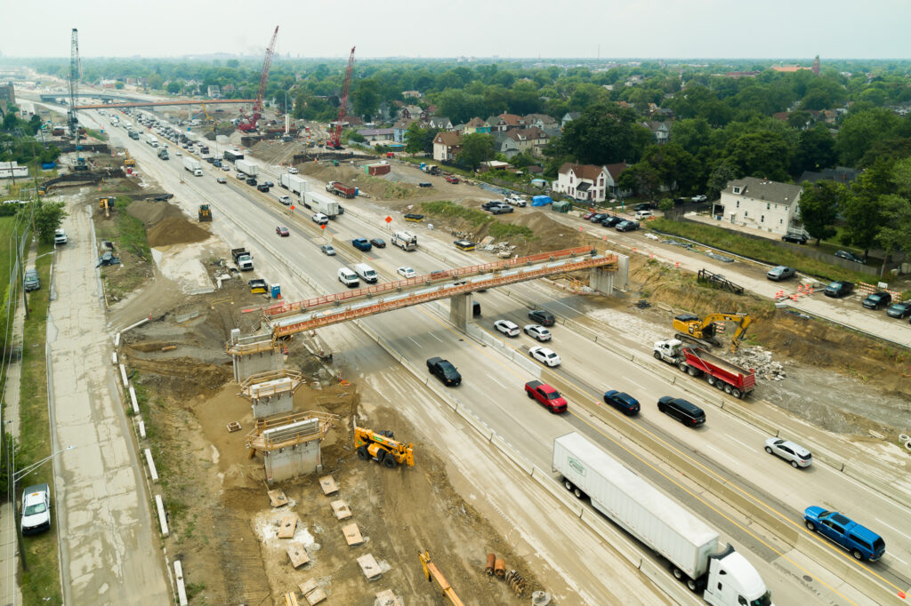 over bridge construction progress with traffic