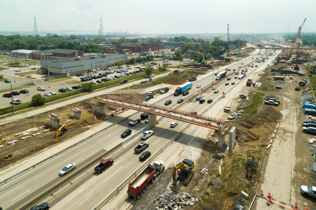 over bridge construction progress with traffic