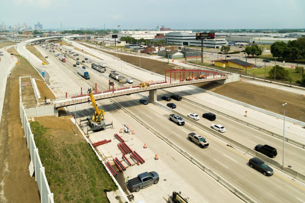 over bridge construction progress with traffic