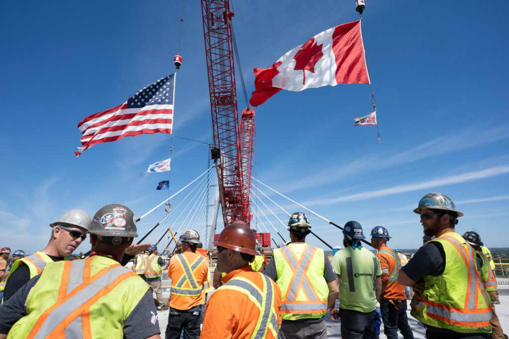 Celebrating the hands helping build - Canada & US Flag