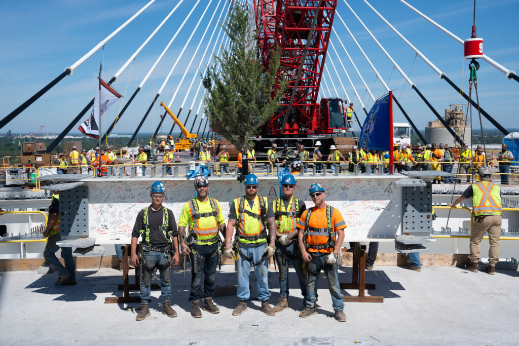 Celebrating the hands helping build - Flag & crane