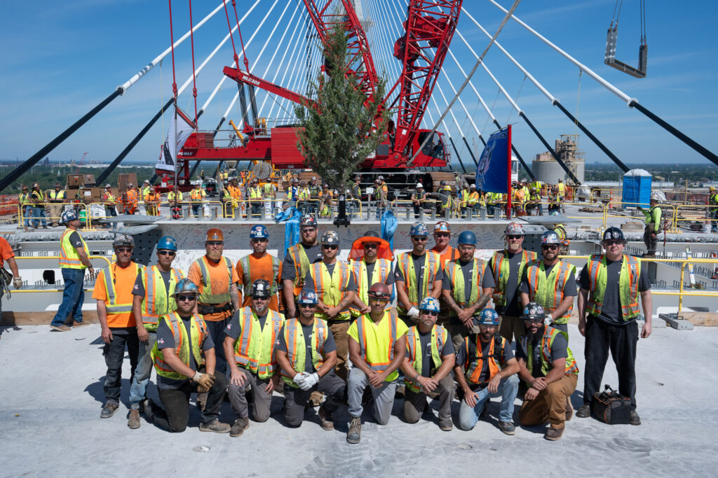 Celebrating the hands helping build - Flag & crane