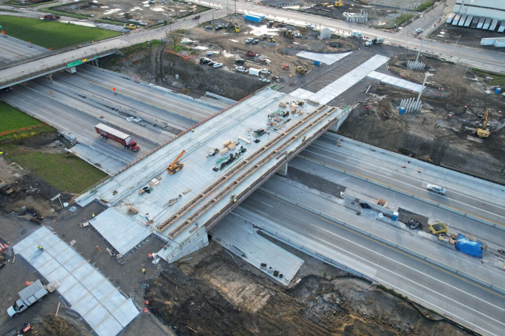 over bridge construction progress with traffic