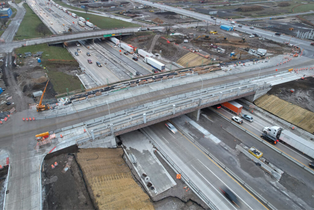 over bridge construction progress with traffic