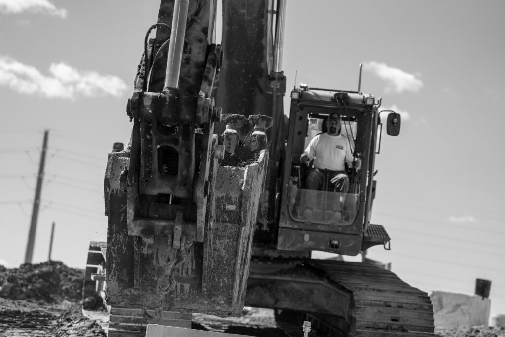 excavator operator black and white
