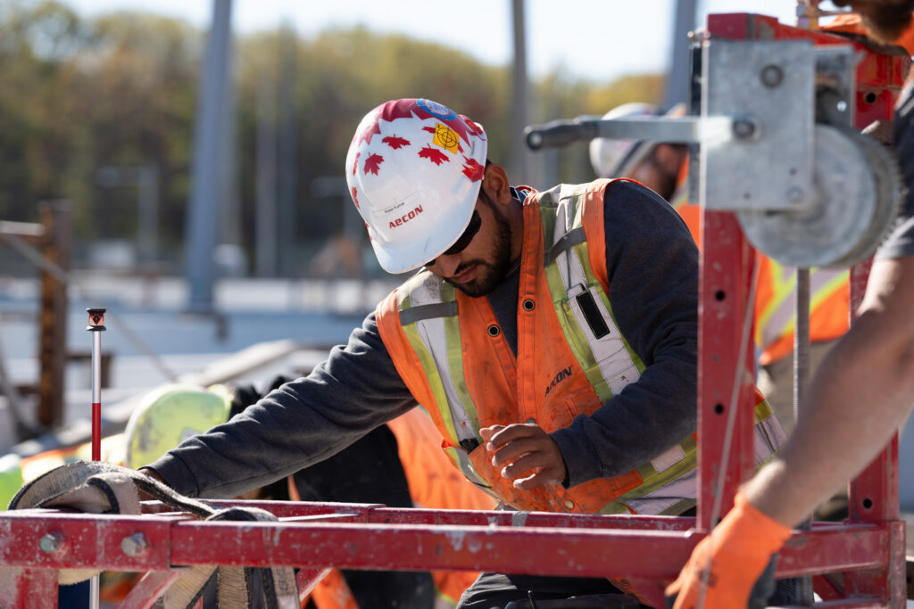 construction worker operating construction machine