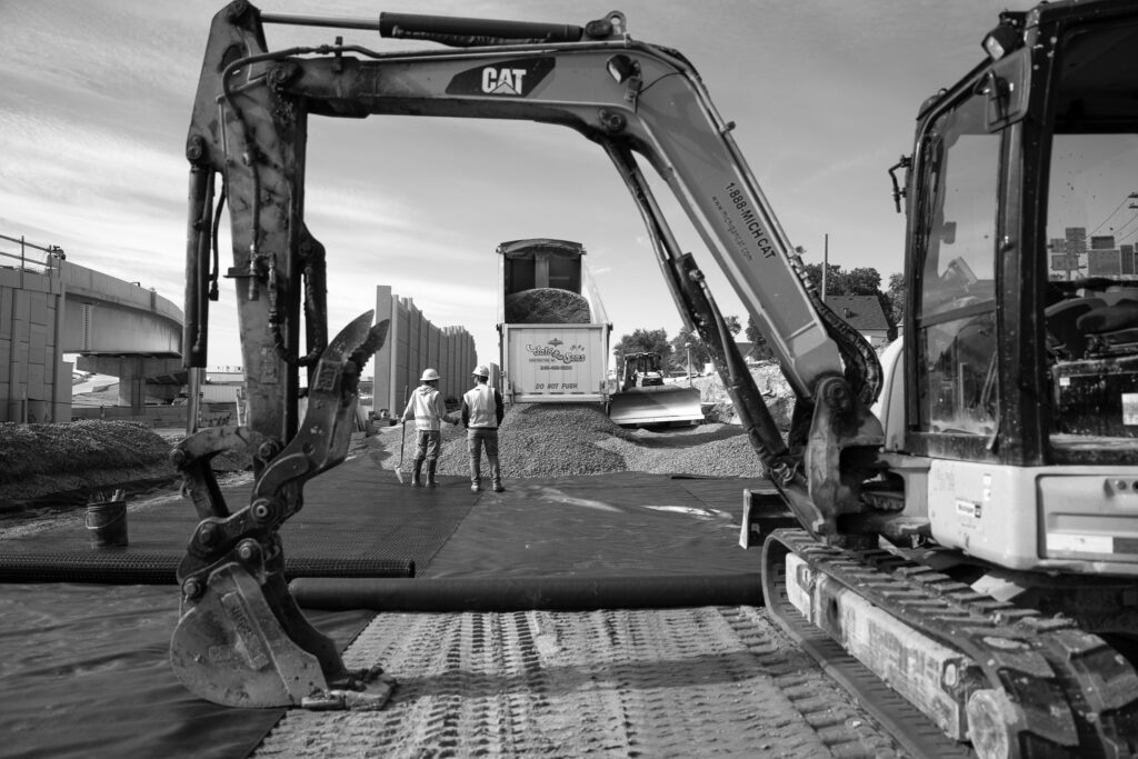construction workers in black and white