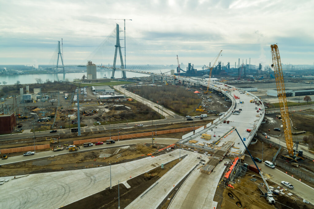 image of all construction on the ground leading to bridge