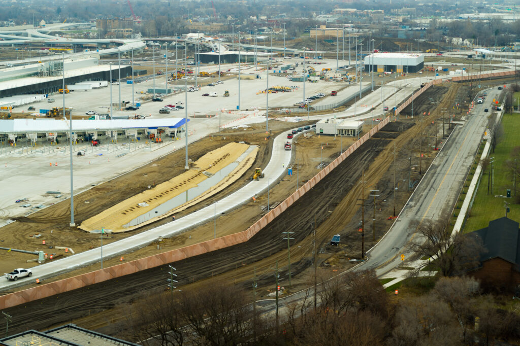 view of road construction inside and outside of perimeter