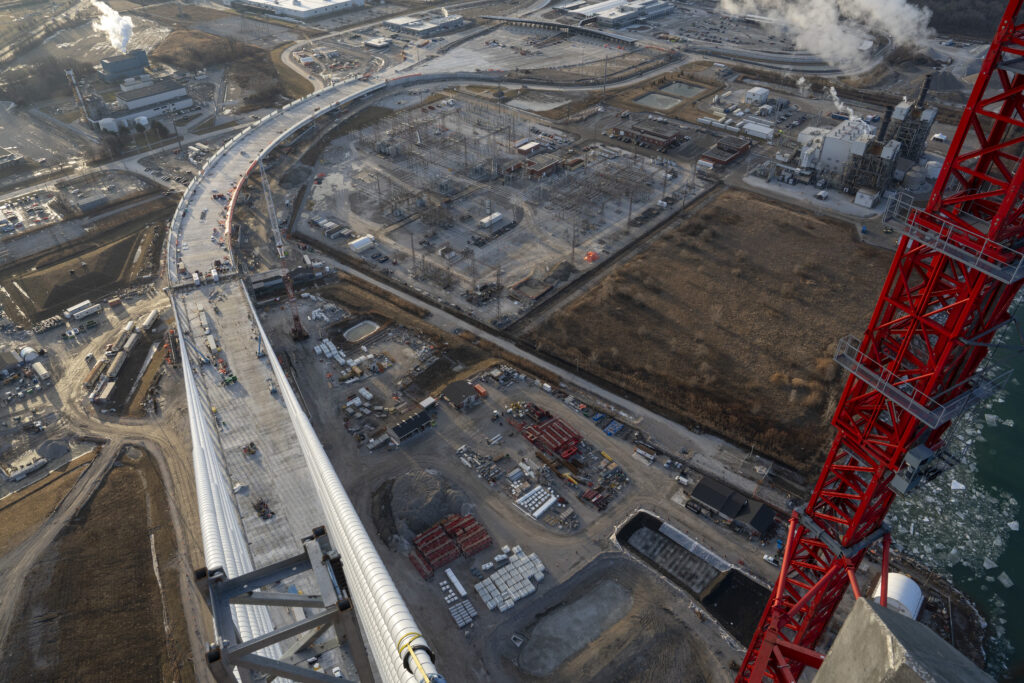 View of bridge construction from the top of crane attached to bridge