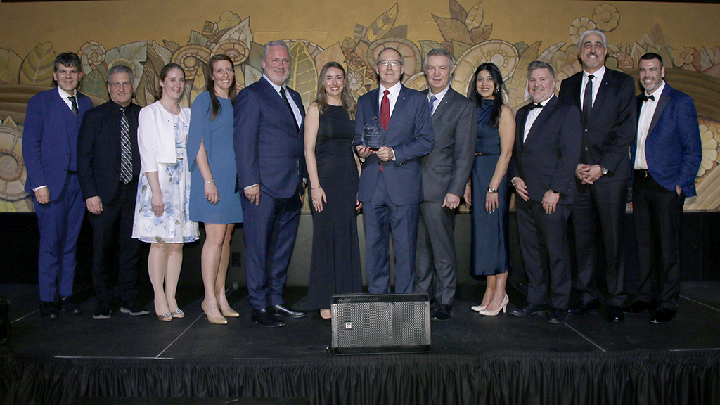 Group photo of Gordie Howe International Bridge project members accepting the Willis Chipman award