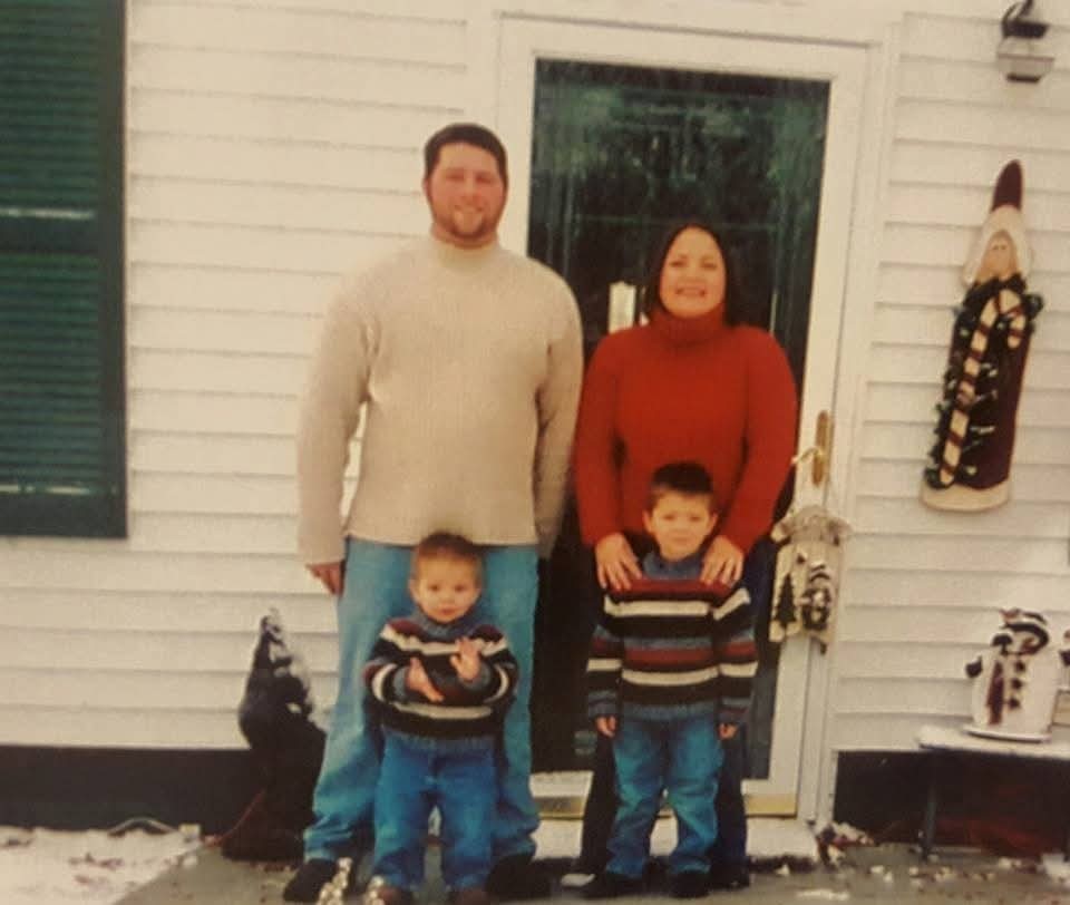 Jayne Griffor with her husband Phillip and their two young sons post for a holiday picture taken on November 30, 2002. Less than a week later, Phillip was tragically killed on a construction site in Detroit.