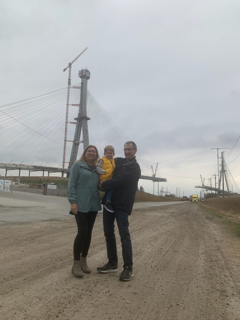 Lucas and his grandparents Jeff and Sharon Marshall visit the Gordie Howe International Bridge on November 17, 2023.